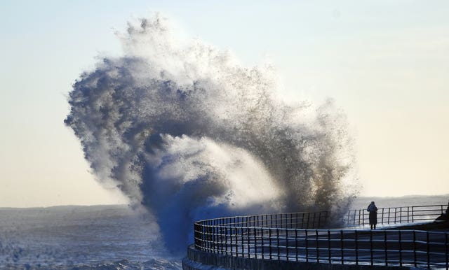 Huge waves smashing against the seafront at Whitley Bay in North Tyneside