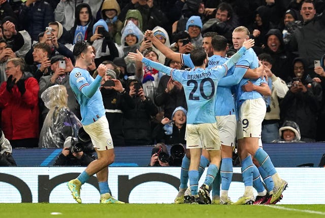 Manchester City celebrate scoring a goal