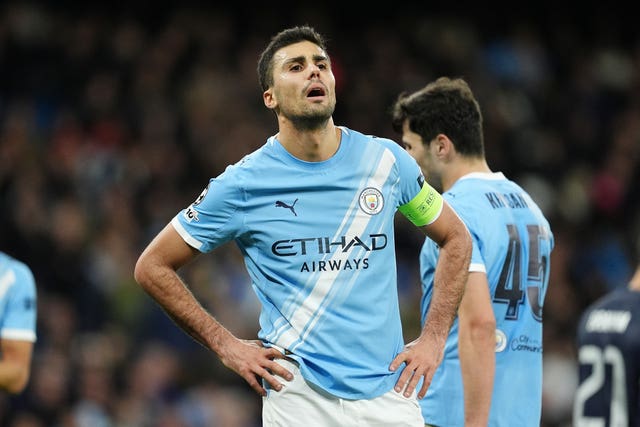 Manchester City's Rodri puts his hands on his hips