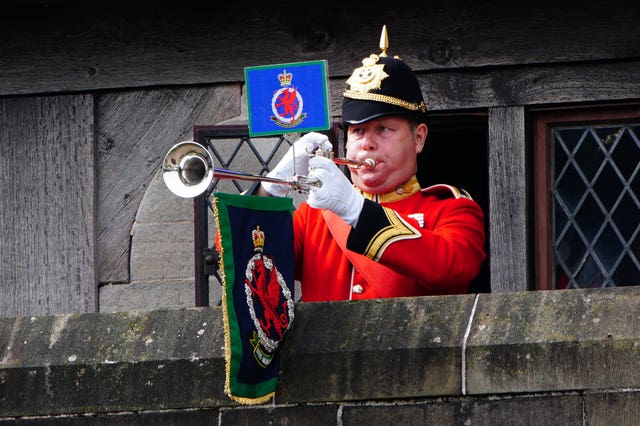 A trumpeteer sounds a fanfare during an Accession Proclamation Ceremony at Cardiff Castle, Wales