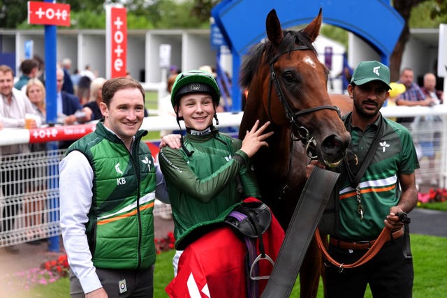 Jockey Billy Loughnane (centre) celebrates winning aboard Bennetot for Ireland 