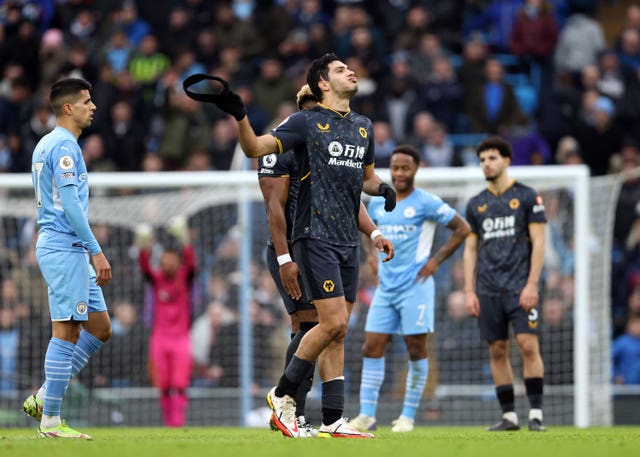 Raul Jimenez, centre, reacts after being sent off