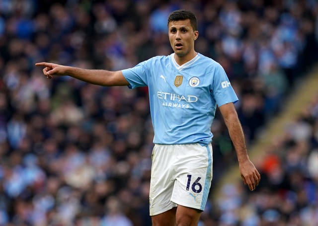 Manchester City midfielder Rodri gestures during a game