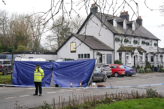 A police cordon outside the Three Horseshoes pub 