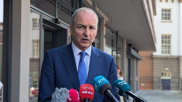 Taioseach Micheal Martin speaks to media at the National Economic Dialogue at Dublin Castle, following discussions between ministers and key budgetary stakeholders on the looming US tariffs