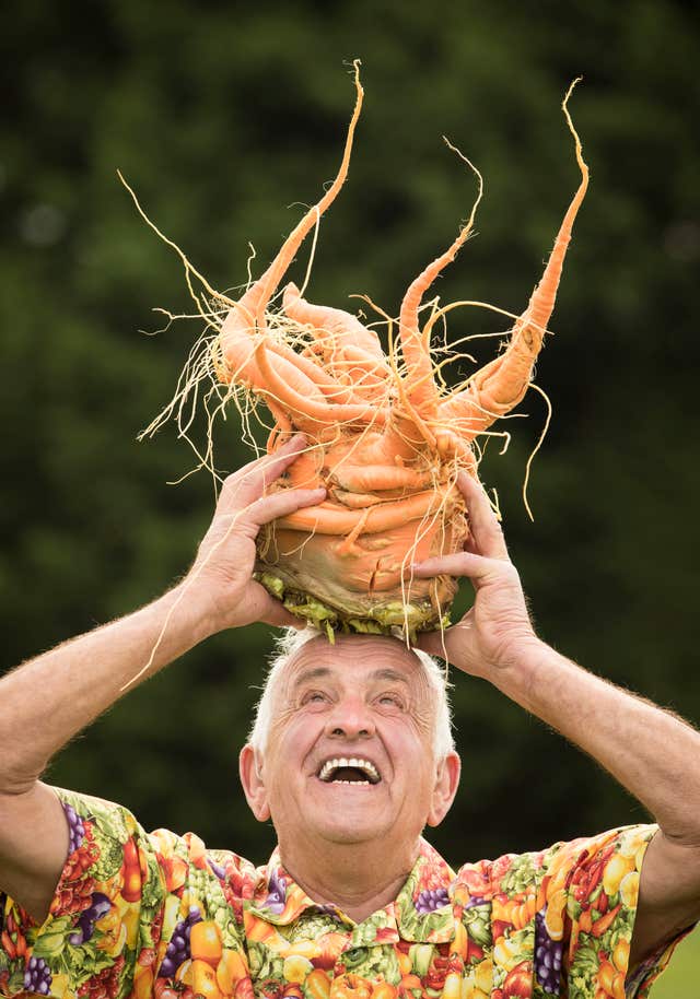 Ian Neale with his winning giant carrot