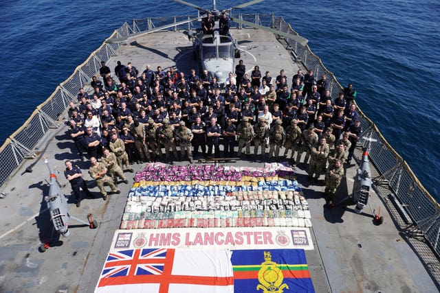 The crew of HMS Lancaster after they seized heroin and methamphetamines from drug smugglers