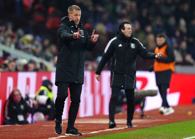 West Ham United manager Graham Potter (left) and Aston Villa manager Unai Emery stand next to each other on the touchline