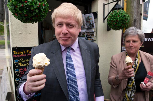 Boris Johnson eating an ice cream in Cornwall (Stefan Rousseau/PA)
