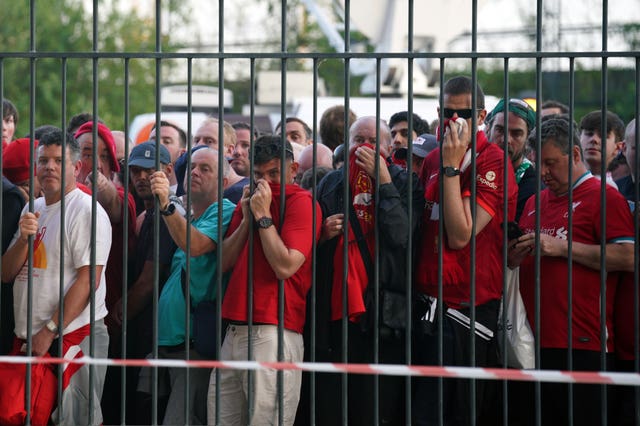 Liverpool supporters found themselves penned against perimeter fences outside Stade de France