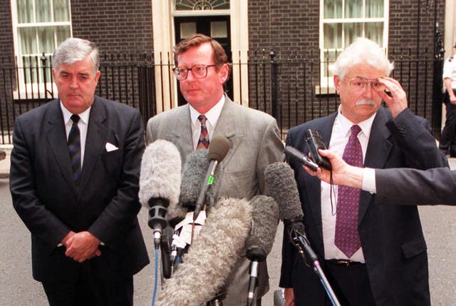 David Trimble , his deputy John Taylor and Ken Maginnis speak to the media outside Downing Street following talks with Tony Blair in 1997