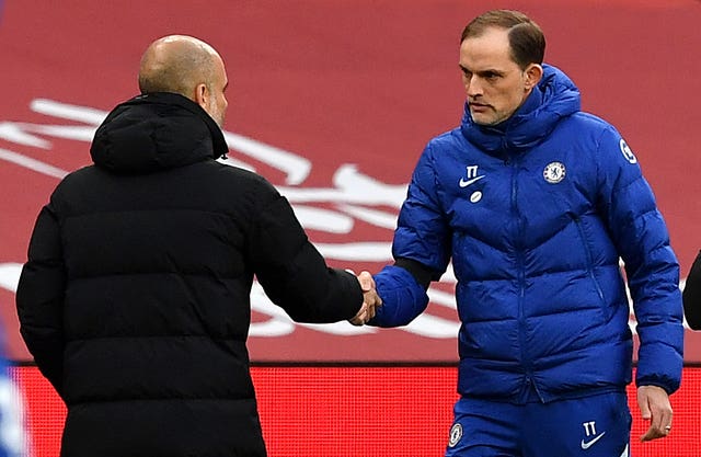 Manchester City manager Pep Guardiola, left, will meet Chelsea manager Thomas Tuchel in the Champions League final