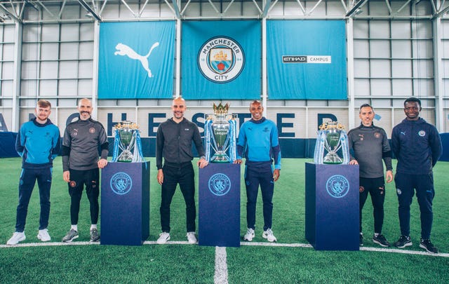 Manchester City win hat-trick of Premier League titles