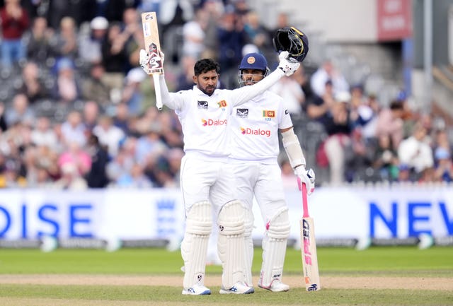 Kamindu Mendis (left) celebrates his century