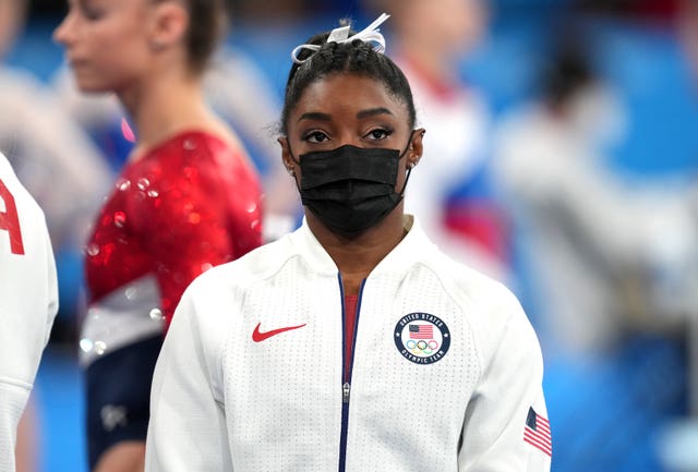 USA’s Simone Biles looks on during the Women’s Team Final after withdrawing through injury.