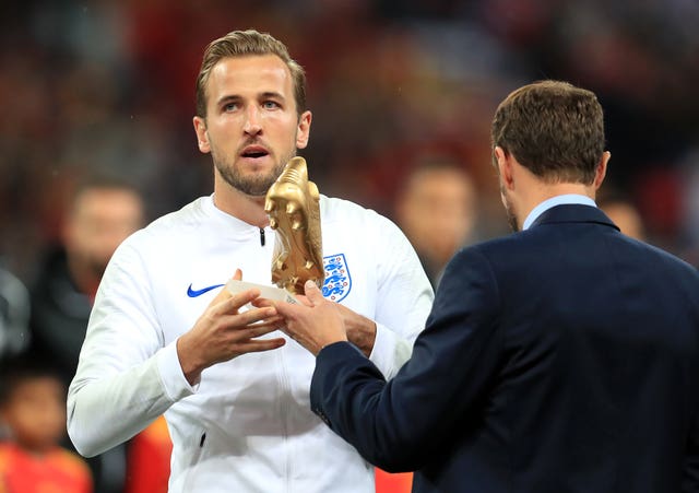 England manager Gareth Southgate, right, presents Harry Kane, left, with the Golden Boot award for the 2018 World Cup