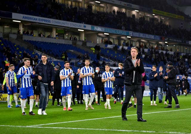 Brighton head coach Graham Potter led his victorious team on a lap of honour at full-time