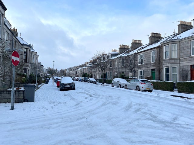 Snow covers roads and cars in Aberdeen
