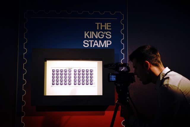 One of the first sheets of the 1st class definitive stamp featuring King Charles III goes on display at the Postal Museum in central London, before they enter circulation later this year 