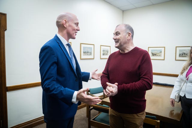 Former bus driver Mark Hehir (right) meets shadow minister for justice Kieran Mullan in the House of Commons, London