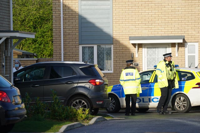 Police at the scene in Meridian Close, Bluntisham, Cambridgeshire, where police found the body of a 32-year-old man with a gunshot wound on Wednesday evening