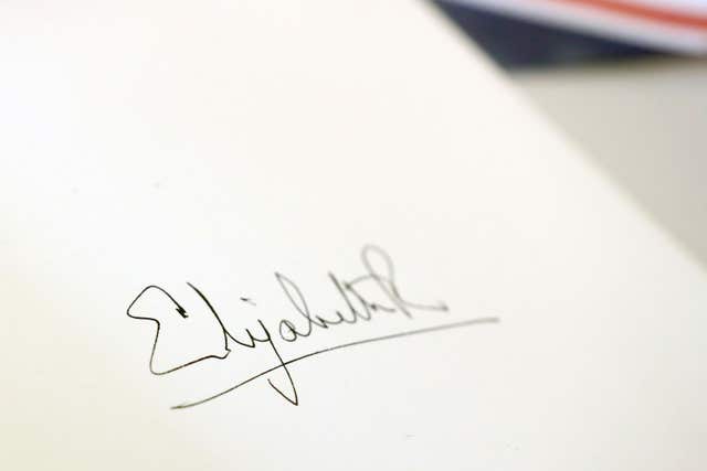 Queen Elizabeth II’s signature in the visitor’s book which she signed during a visit to the Royal College of Physicians in London (Chris Jackson/PA)