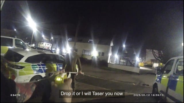 Screengrab from handout bodyworn footage of Alexander Dighton outside Talbot Green Police Station in Rhondda Cynon Taf