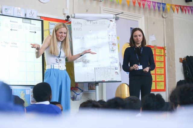 Early career teacher Katie Juckes (left) with early career teacher mentor Skaiste Anuzyte-Becker, during a Year 4 maths lesson at King Soloman Younger Years site in Paddington