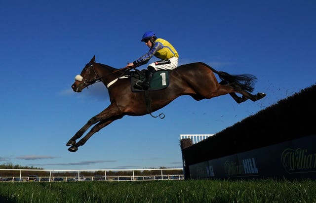 Minella Trump and Brian Hughes jump the last to go on and win the Lyn And Holly’s Big Birthday Celebrations Novices’ Chase at Catterick