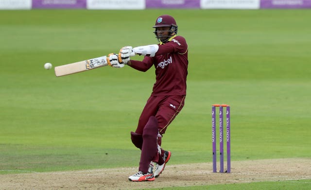 Marlon Samuels hit 51 to help West Indies narrowly beat Scotland and book their place at the 2019 World Cup 