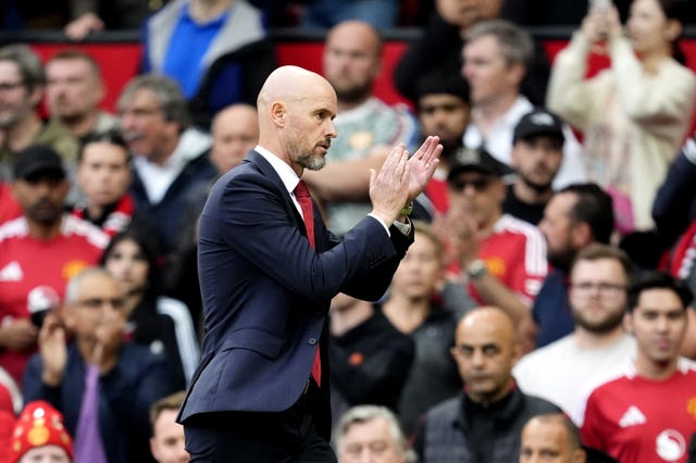 Manchester United manager Erik ten Hag applauds the fans as he walks off at half time during the Premier League match at Old Trafford, Manchester. 