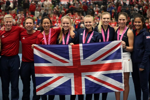 The Great Britain team celebrate reaching the Fed Cup World Group II play-offs