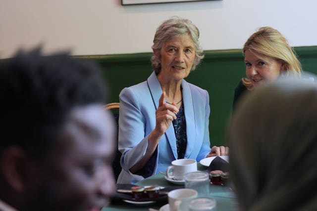 Irish President Catherine Connolly, left, attends a lunch at the London Irish Centre in Camden, north London