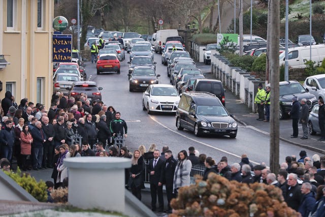 The funeral cortege of Shaun Harkin