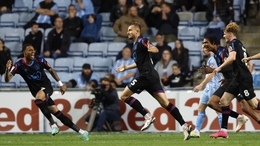 Huddersfield’s Michal Helik, centre, celebrates their equaliser (Nigel French/PA)