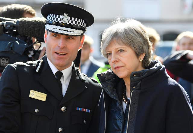 Prime Minister Theresa May, with Wiltshire Police Chief Constable Kier Pritchard, in Salisbury as she views the area of the suspected nerve agent attack on Russian double agent Sergei Skripal and his daughter Yulia (Toby Melville/PA)