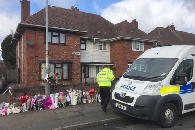 Flowers outside the Wolverhampton property where Jasmine Forrester was fatally injured (Matthew Cooper/PA)