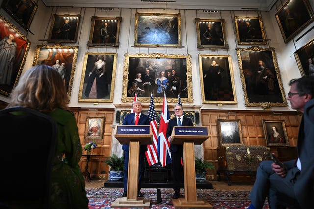 Donald Trump and Sir Keir Starmer at lecterns facing the media