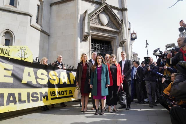 Stella Assange, the wife of Julian Assange, (centre) outside the Royal Courts of Justice in London 