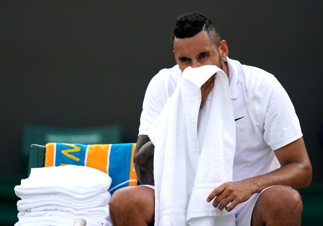 Nick Kyrgios wipes his mouth