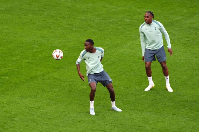 Tottenham's Pape Sarr (left) during a training session