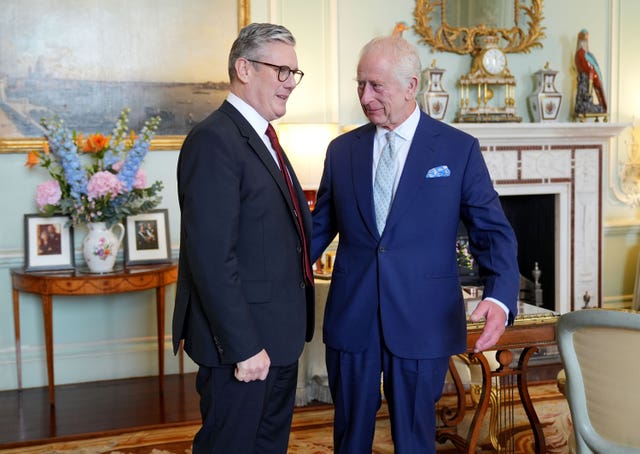 The King welcomes new Prime Minister Sir Keir Starmer to the Palace 