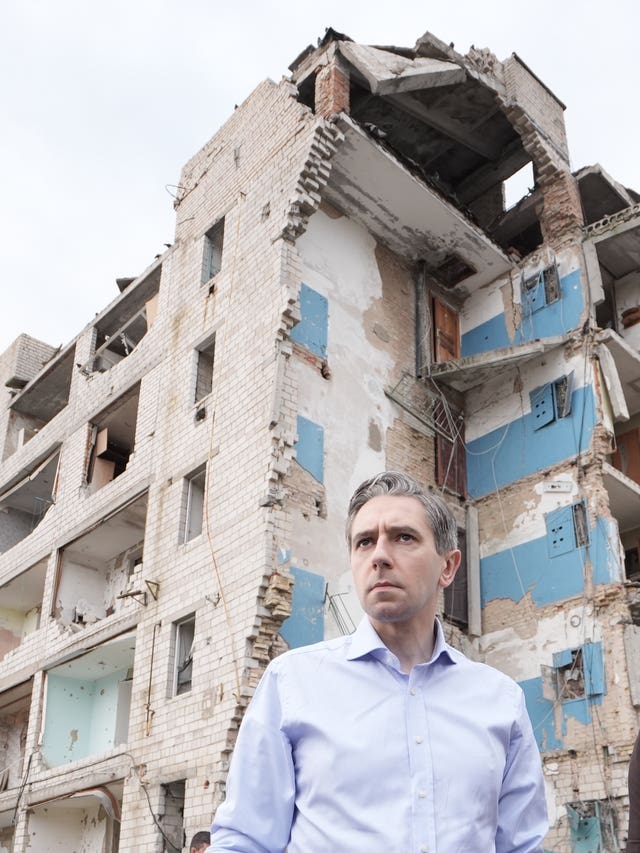 Taoiseach Simon Harris during a visit to inspect damage to buildings in Borodyanka, Ukraine