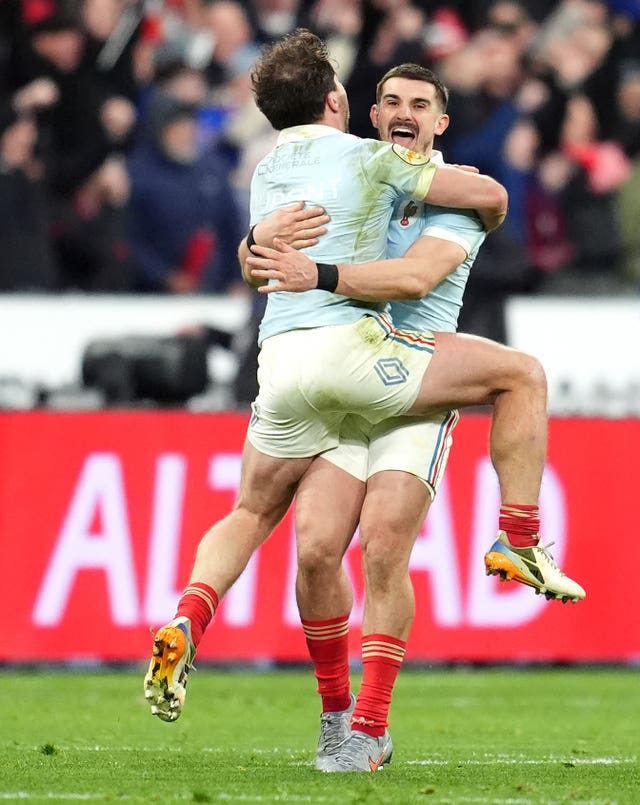France’s Thomas Ramos (facing) celebrates the winning penalty