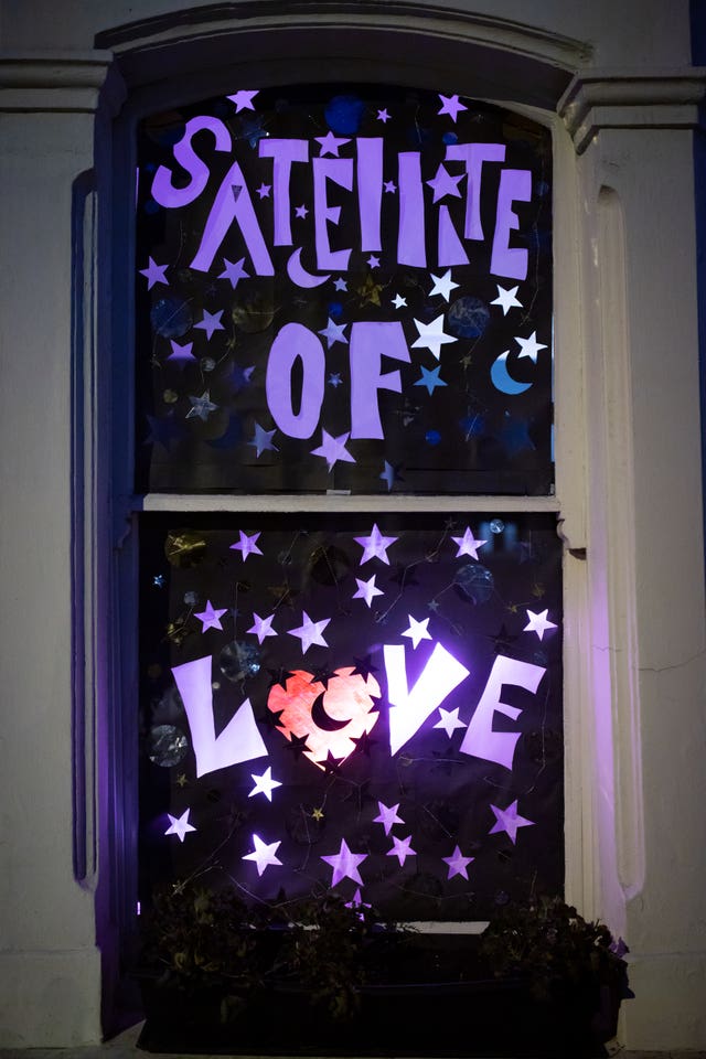 A window reading 'Satellite of Love'