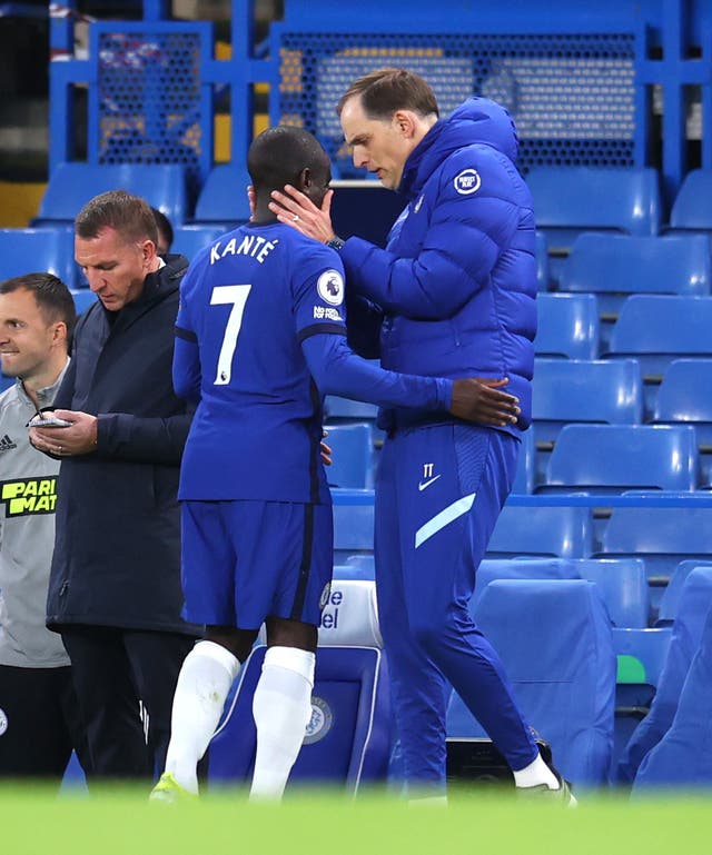 Thomas Tuchel consoles N’Golo Kante, left, as he leaves the field injured