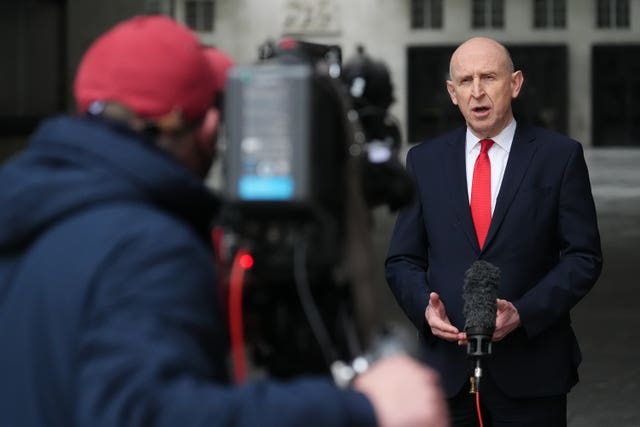 Defence Secretary John Healey speaks to the media