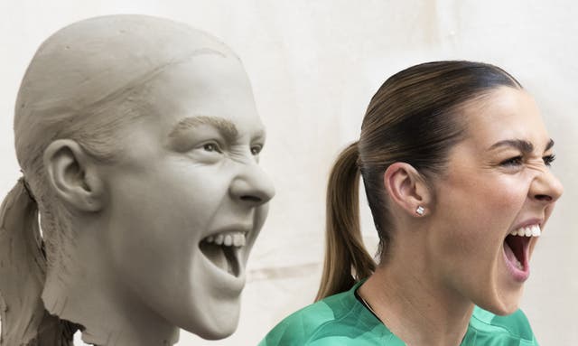 Madame Tussauds' Mary Earps figure next to Mary Earps, both head and shoulders