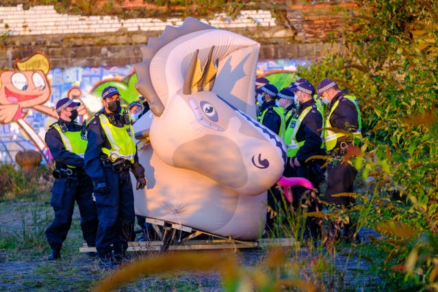 Police with inflatable Loch Ness monster