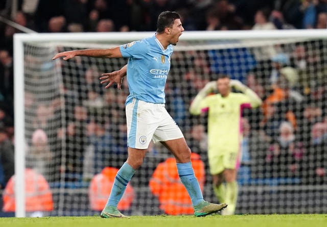 Rodri celebrates scoring against Chelsea